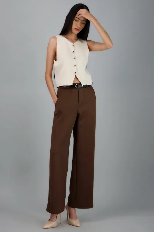 Pantalon estilo recto con cinturon sold by Shasa