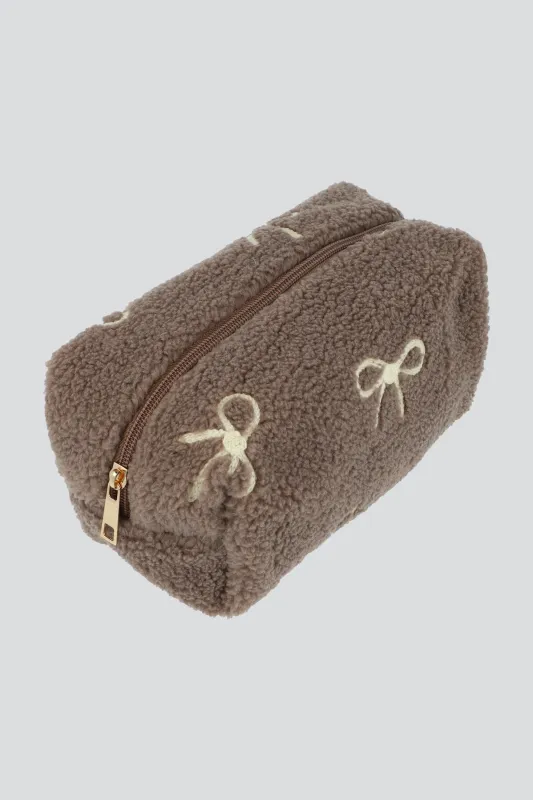 Cosmetiquera moño borrego sold by Shasa