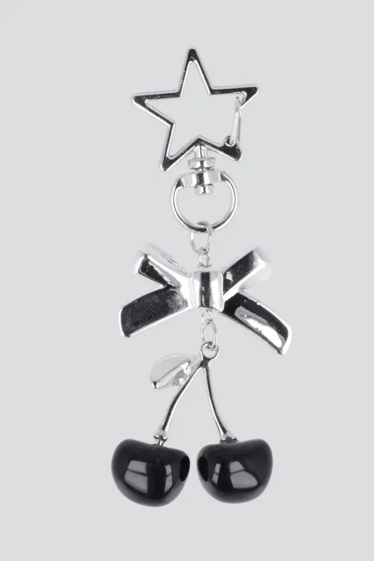 Llavero moño cerezas sold by Shasa