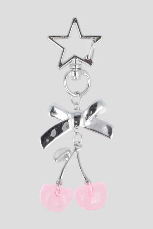 Llavero moño cerezas sold by Shasa