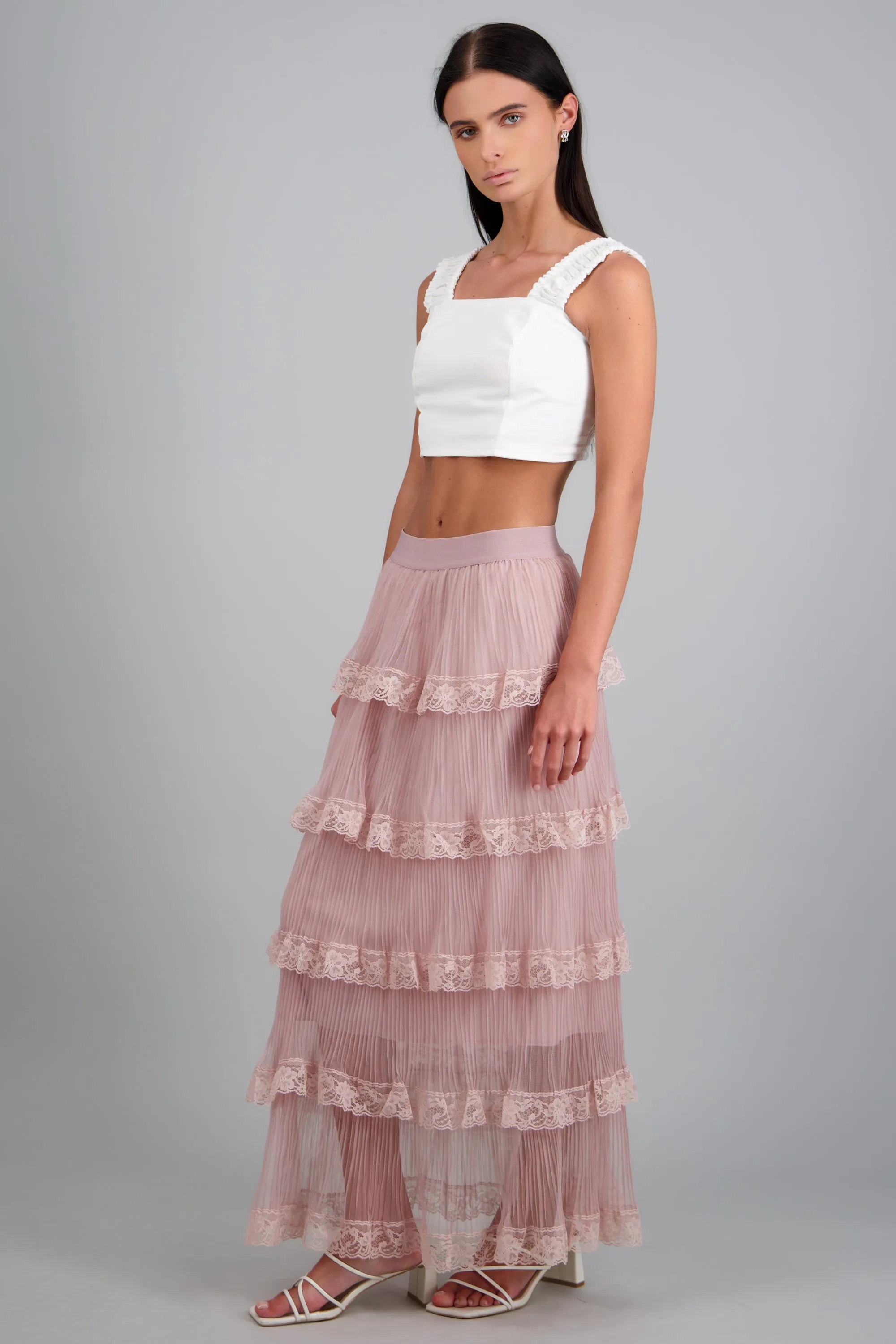 Falda midi olanes sold by Shasa