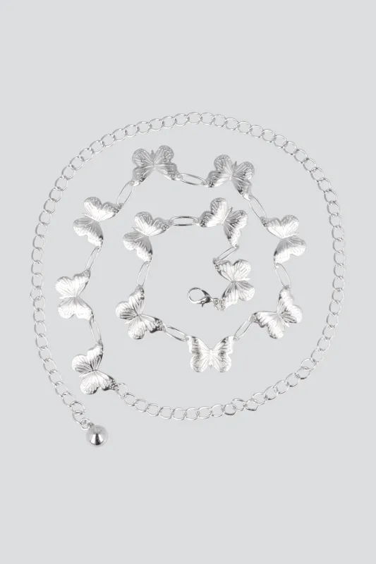 Cinturón cadena mariposas martelinadas sold by Shasa