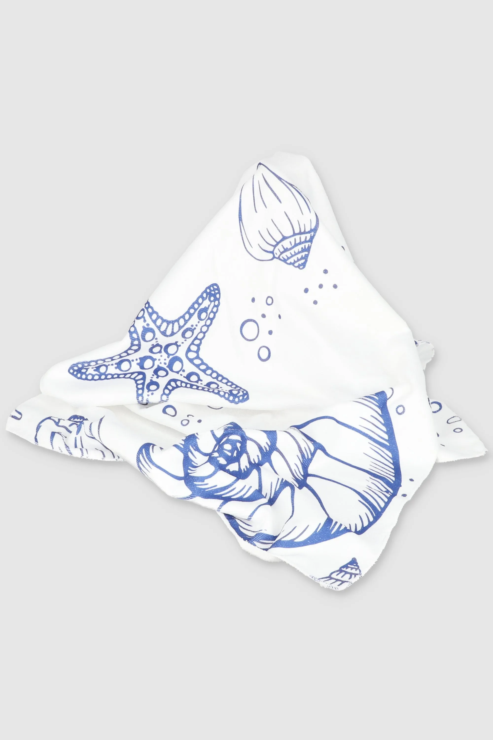 Toalla de conchas sold by Shasa