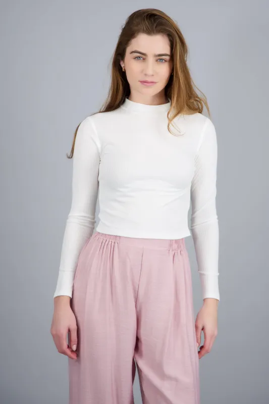 Top crop manga larga cuello alto sold by Shasa