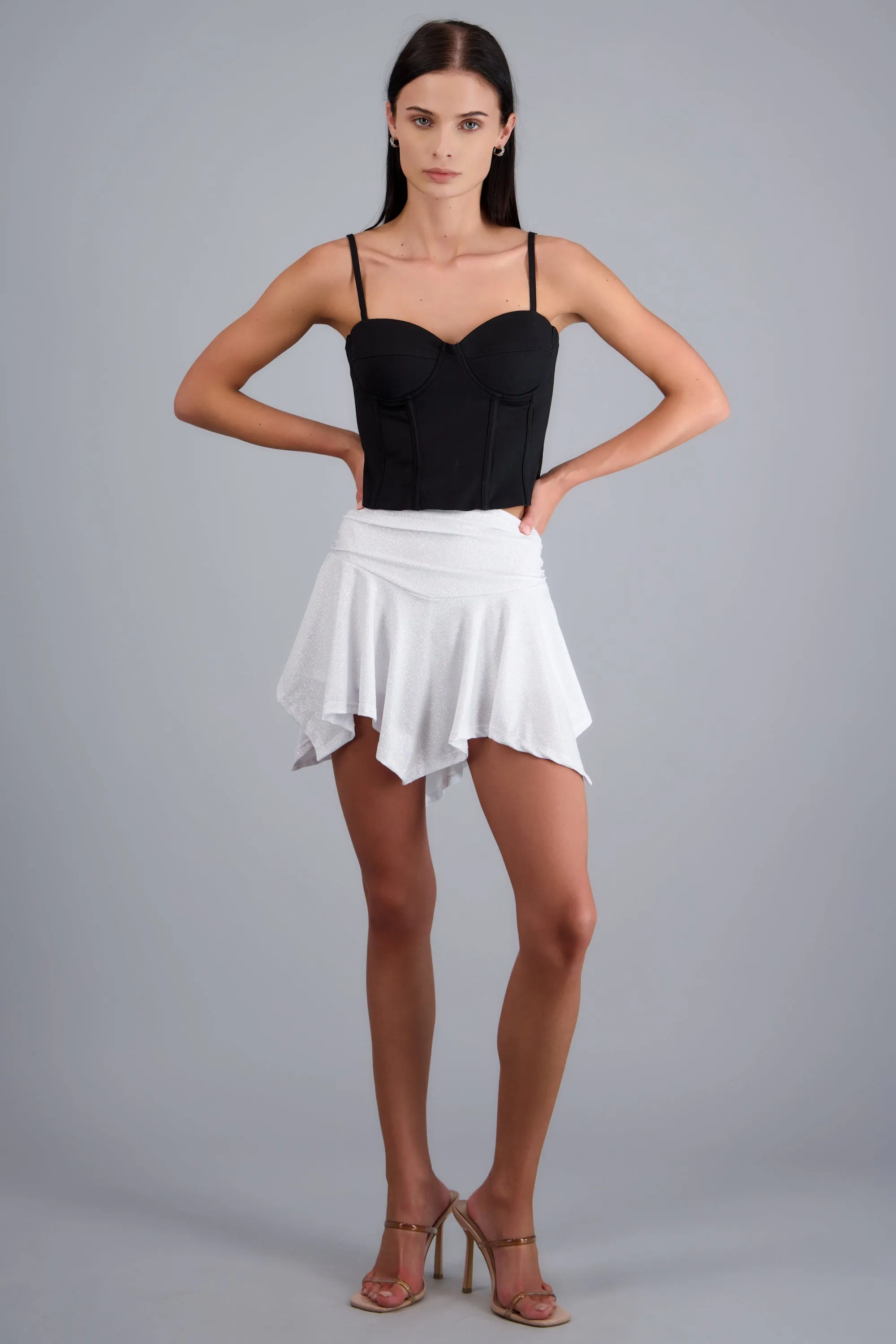 Falda asimetrica brillos sold by Shasa