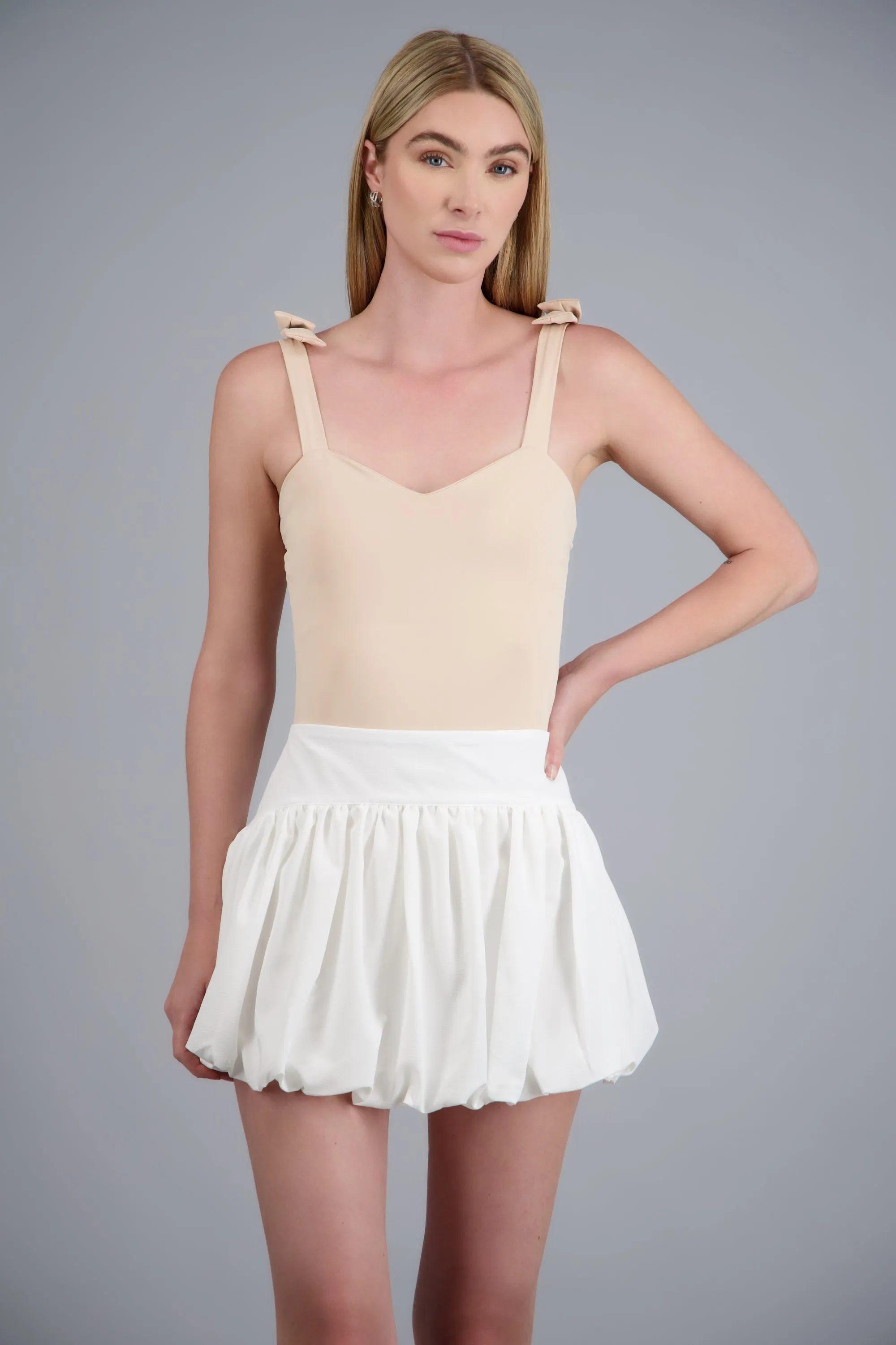 Bodysuit liso con tirante moños sold by Shasa