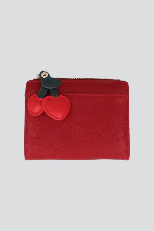 Cartera charm cerezas sold by Shasa