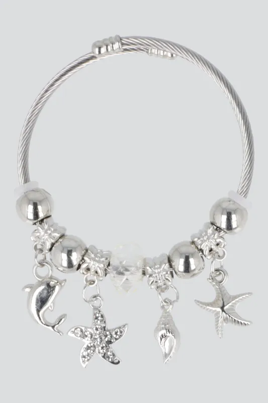 PULSERA RESORTE CHARMS DELFIN made by Shasa