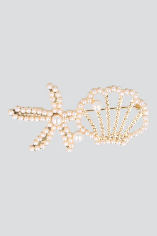 Broche estrella concha mar made by Shasa