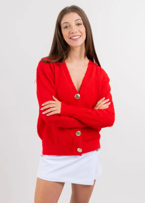 Cárdigan peluche botones sold by Shasa