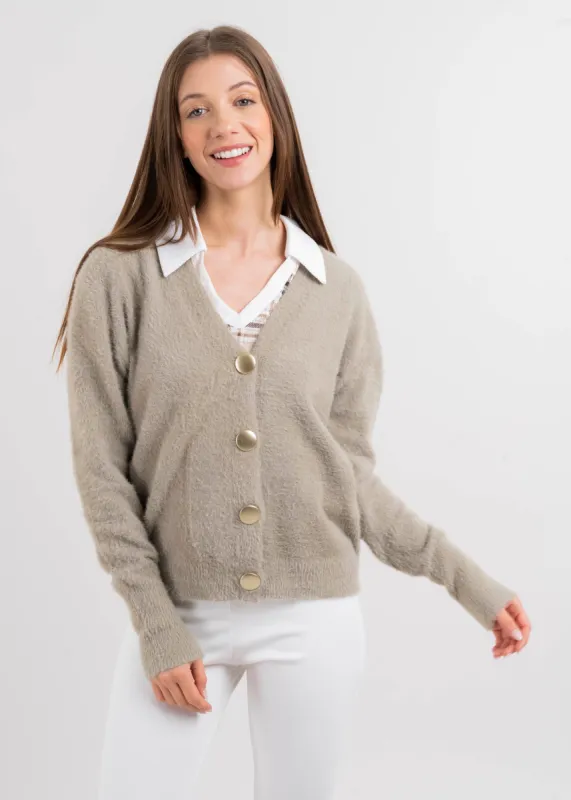 Cárdigan peluche botones sold by Shasa