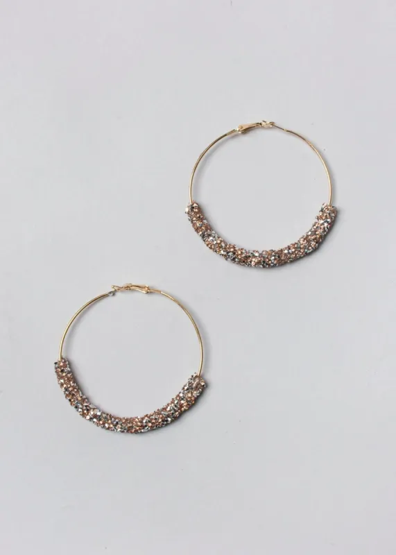 Arracadas glitter medianas sold by Shasa