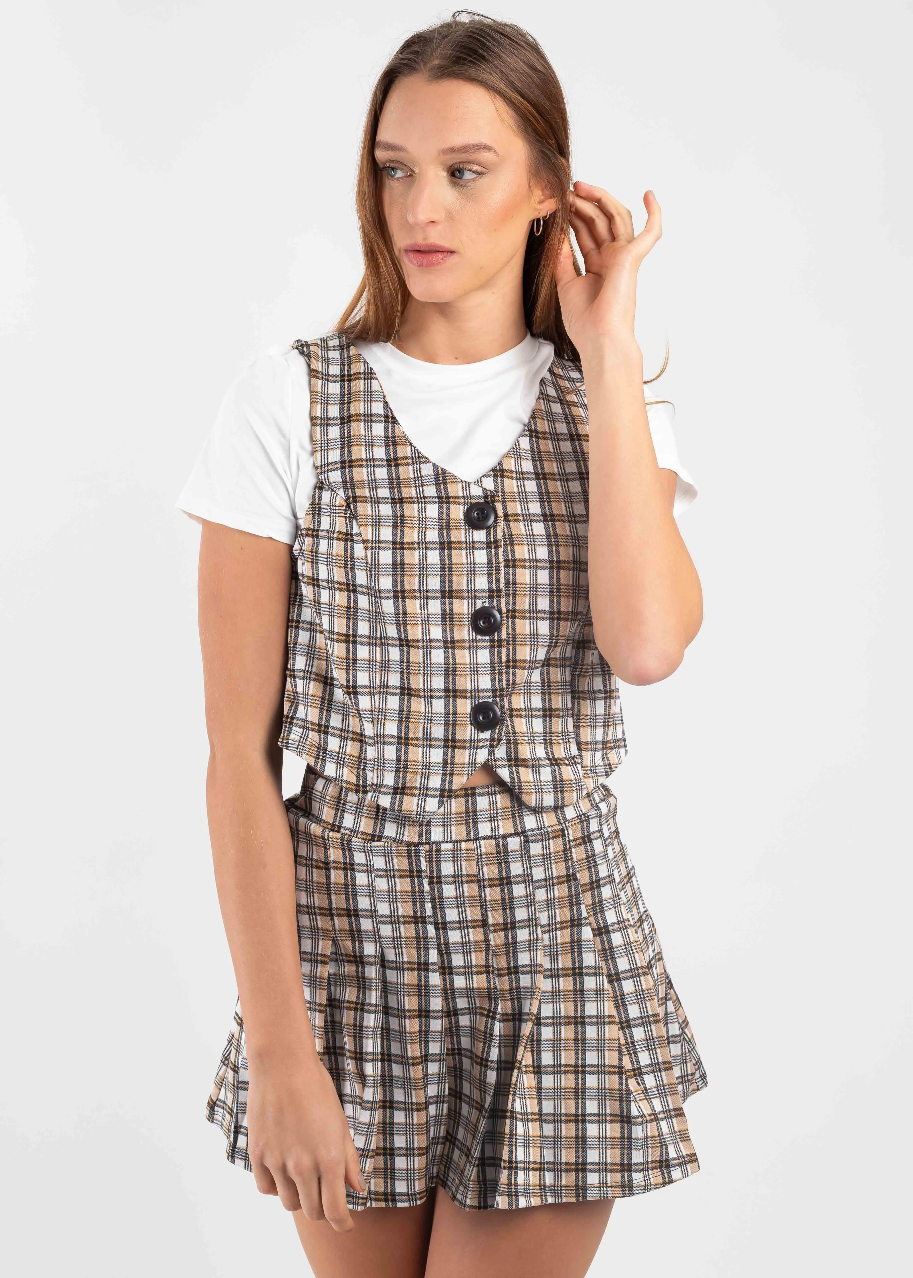 Top chaleco botones cuadros sold by Shasa