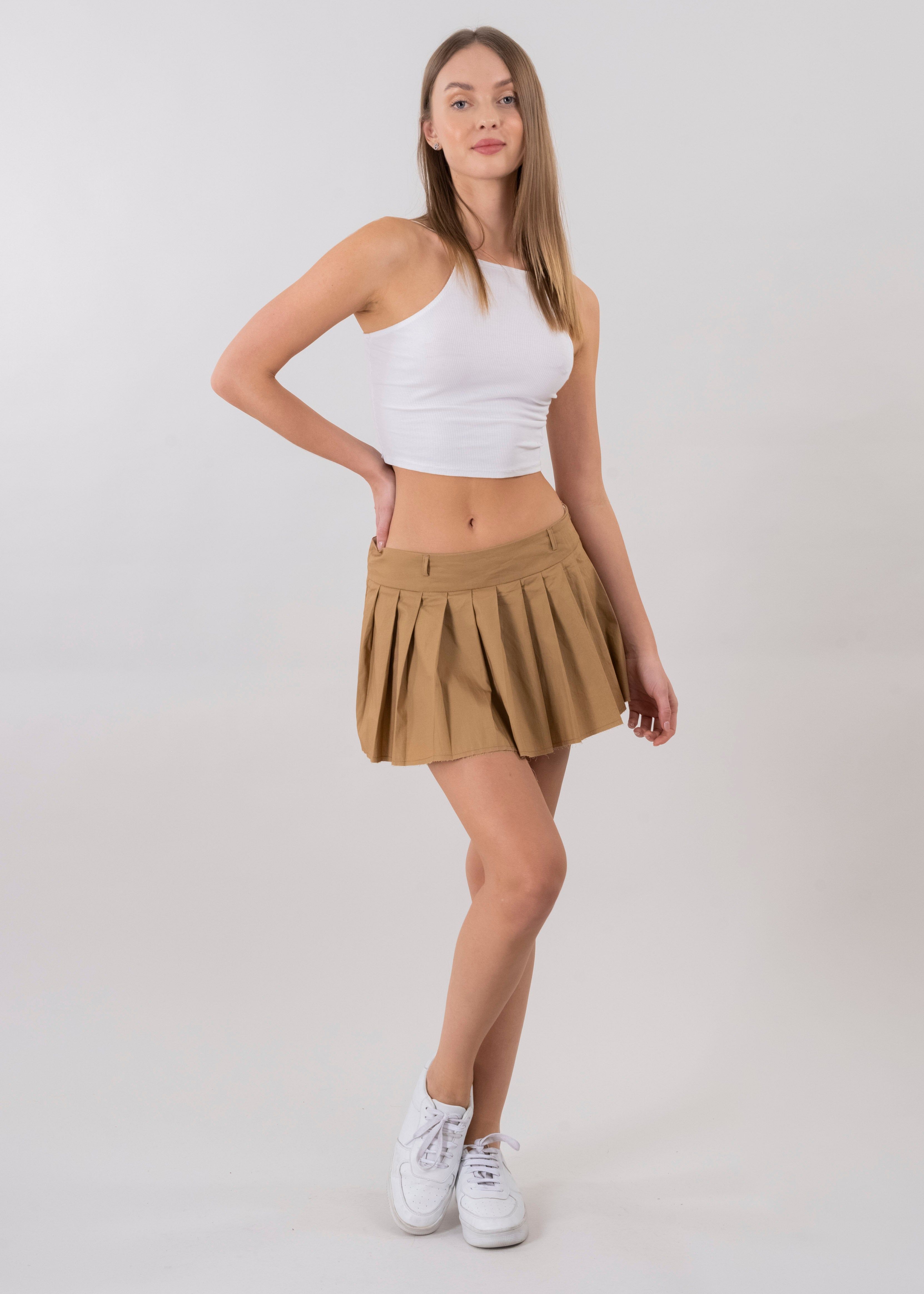 Falda mini tableada lisa sold by Shasa