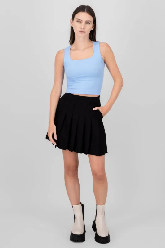 Minifalda tableada con bolsas y short sold by Shasa