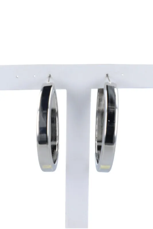 Arracadas metálicas lisas sold by Shasa