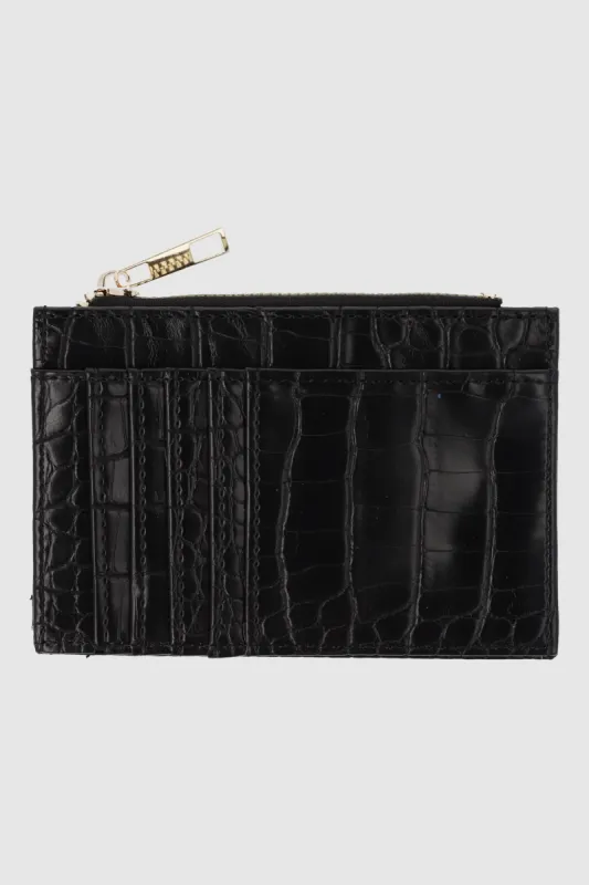 Cartera pequeña efecto croco sold by Shasa