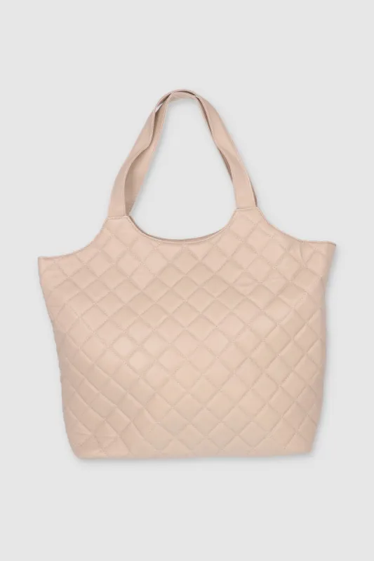 Bolsa tote grande capitonada sold by Shasa