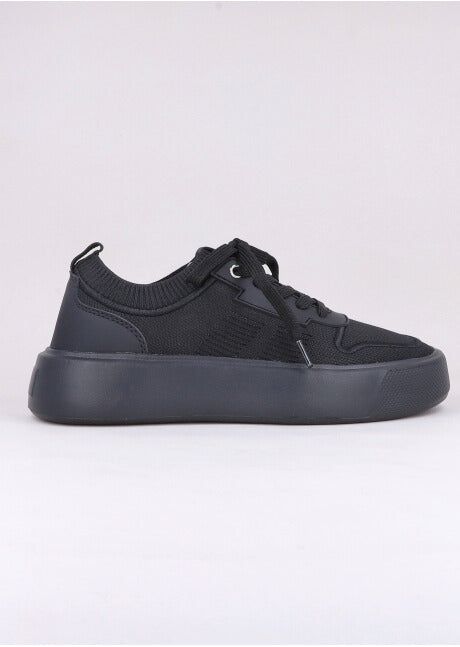 Tenis retro tejido sold by Shasa