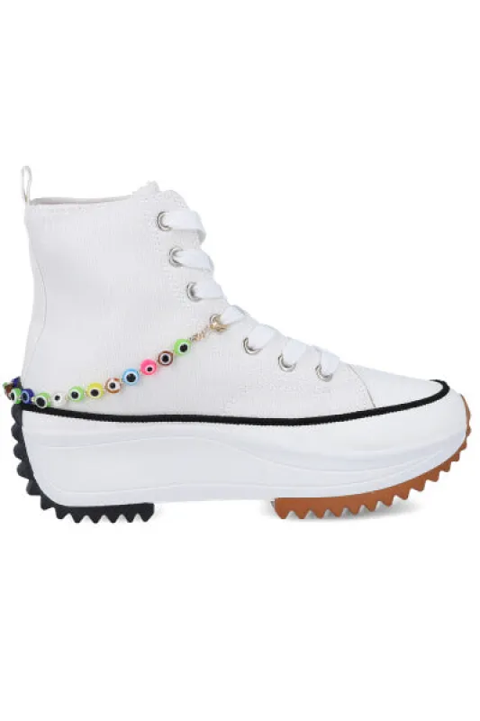 Tenis canvas plataforma bicolor sold by Shasa