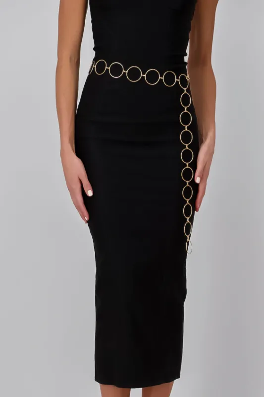 Cinturón cadena círculos sold by Shasa