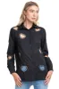Camisa over corazones sold by Shasa