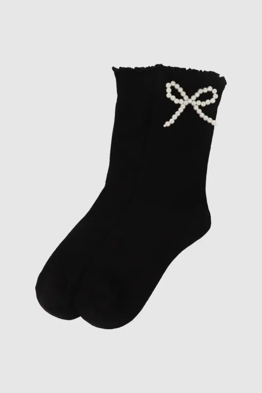 Calcetin moño perlas sold by Shasa