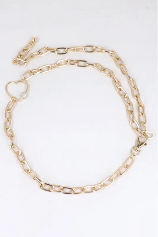 Cinturón cadena corazón sold by Shasa