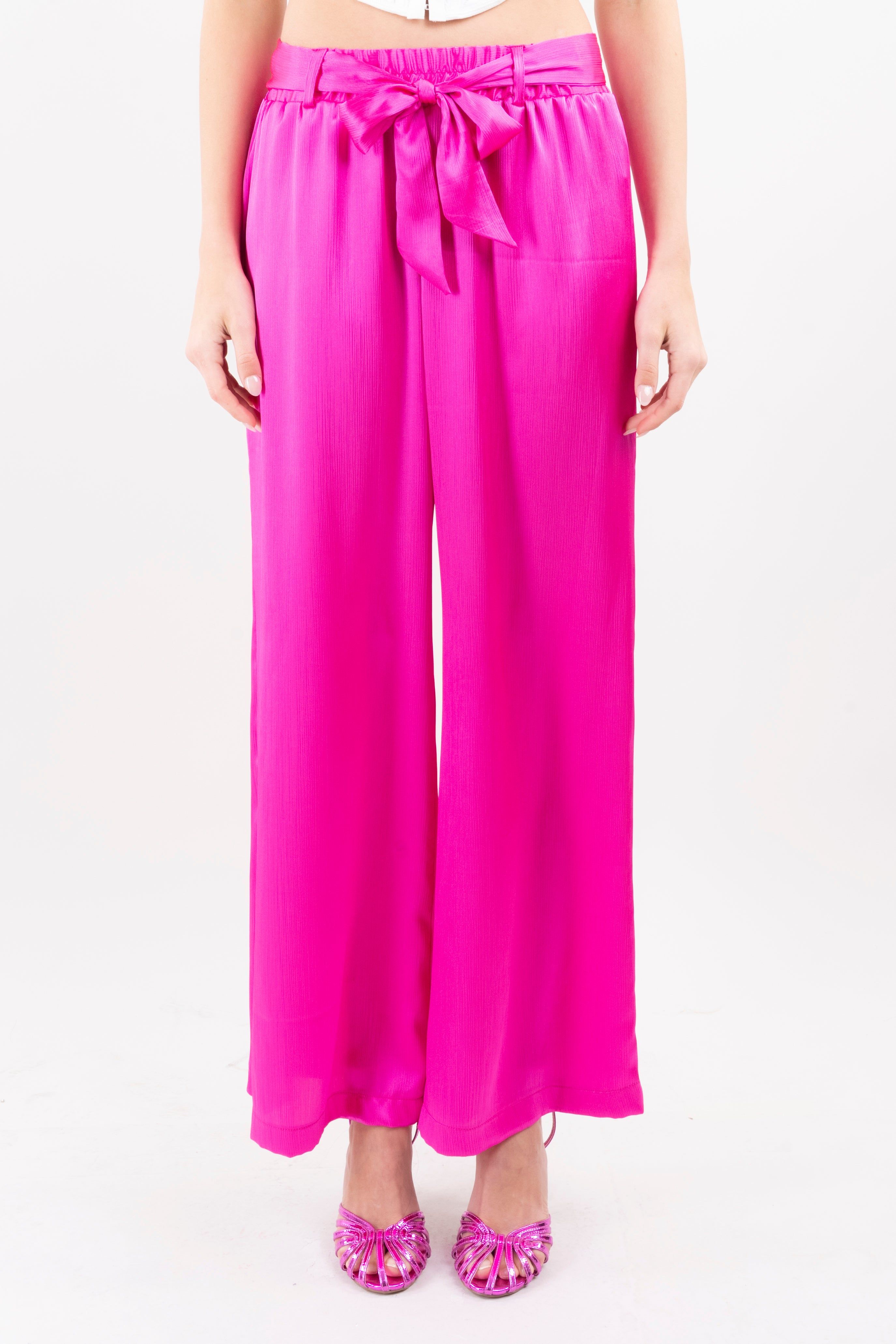 Pantalón fluido moño sold by Shasa