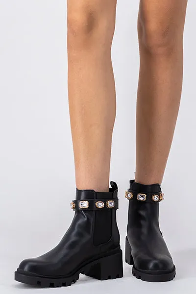 Botín suela track brillos sold by Shasa