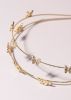 Diadema doble mariposas sold by Shasa