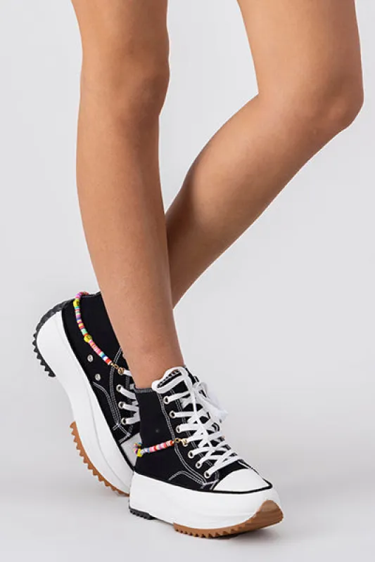 Tenis canvas plataforma bicolor sold by Shasa