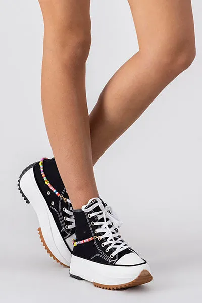 Tenis canvas plataforma bicolor sold by Shasa