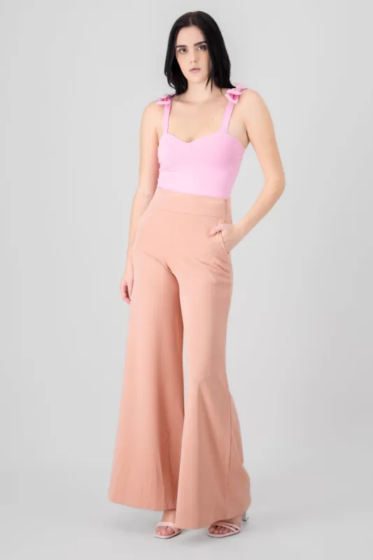 Pantalon liso cierre sold by Shasa