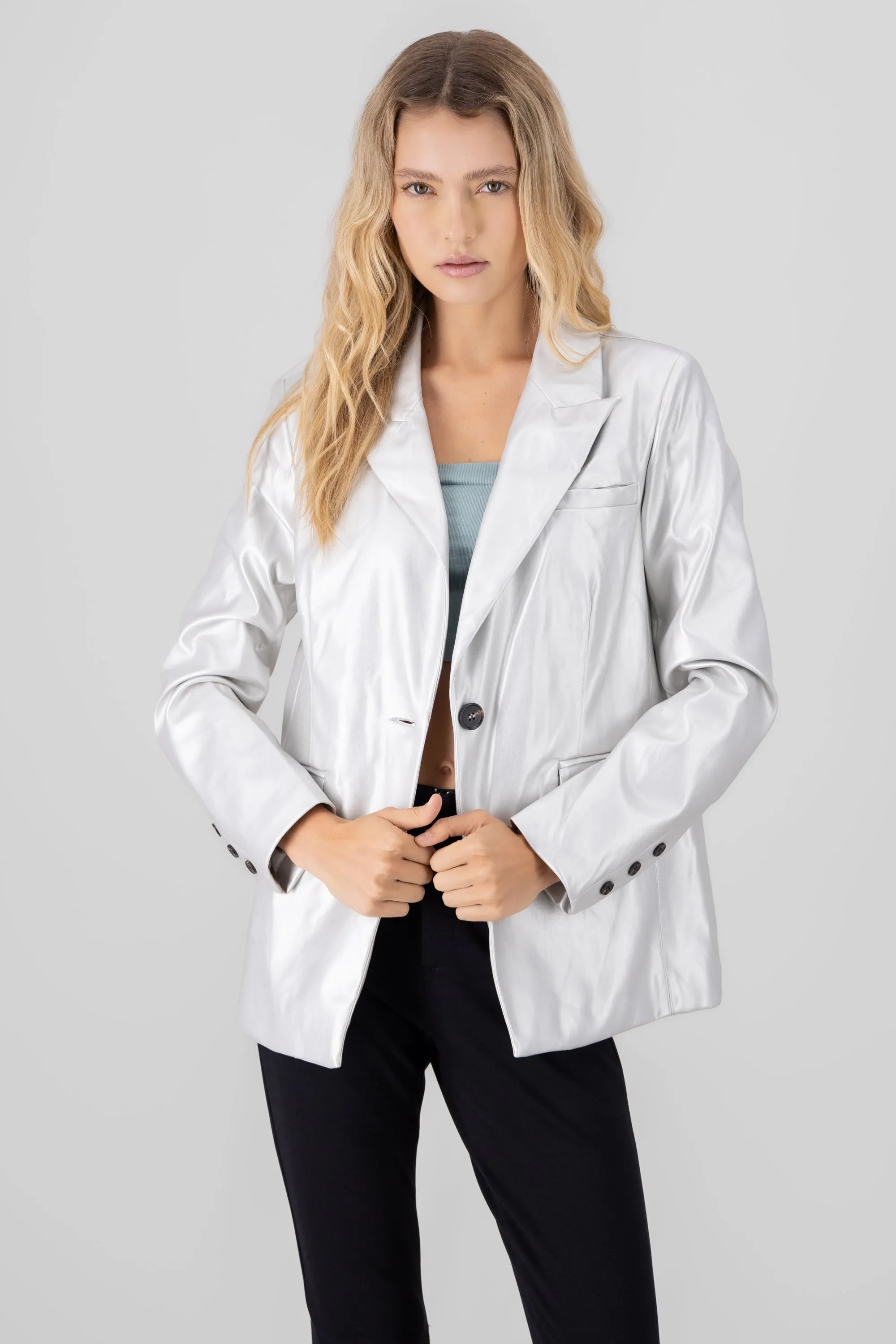 Saco sastreado metalico sold by Shasa