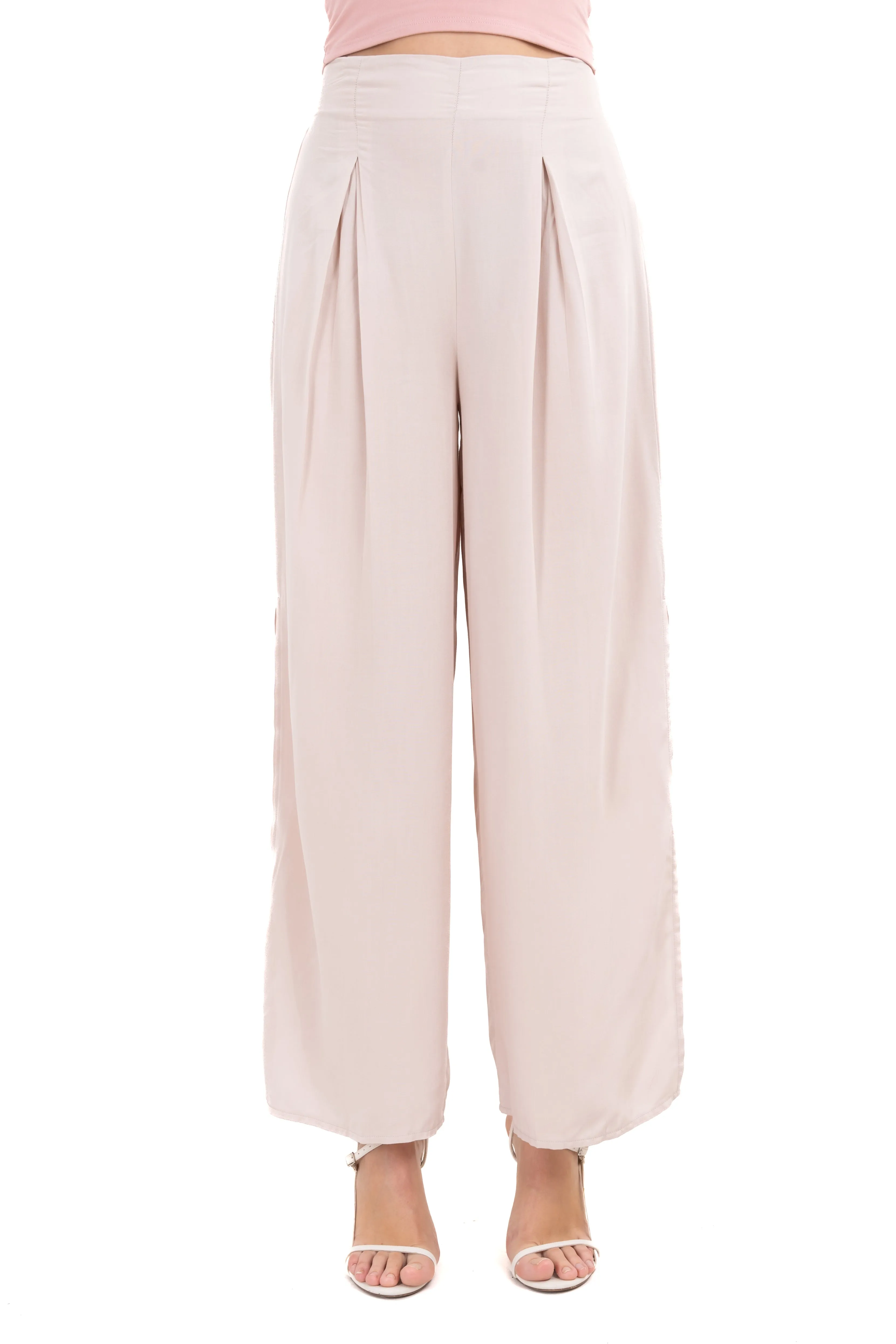 Pantalón wide leg aberturas laterales sold by Shasa