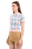 Top cuello polo rombos sold by Shasa