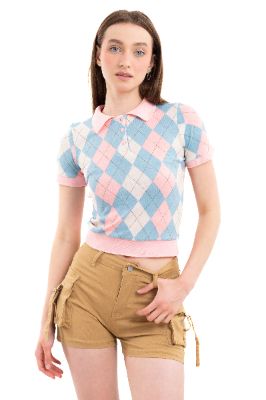 Top cuello polo rombos sold by Shasa