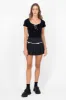 Falda tableada lisa mono sold by Shasa