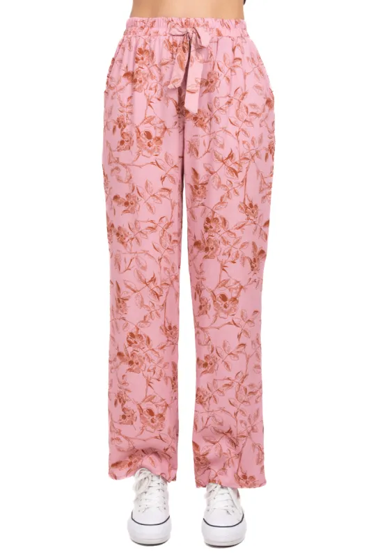 Pantalón recto cintas flores sold by Shasa