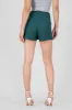 Falda short liso botones sold by Shasa