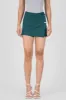 Falda short liso botones sold by Shasa