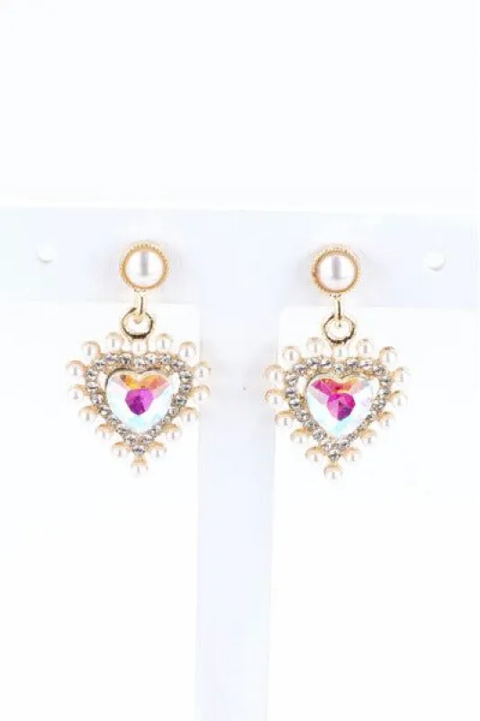 Aretes largos corazón sold by Shasa