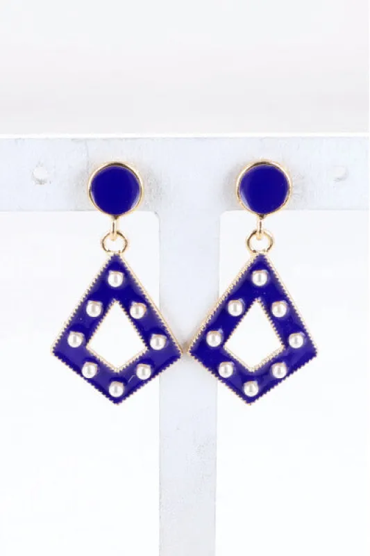 Aretes Triangulo Perlas Color sold by Shasa
