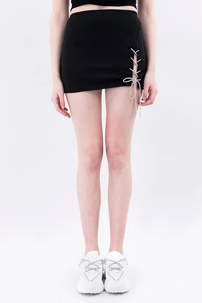 Falda mini tira brillos sold by Shasa