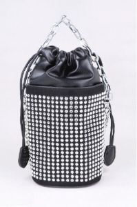 Bolsa redonda multi brillos sold by Shasa