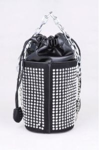 Bolsa redonda multi brillos sold by Shasa