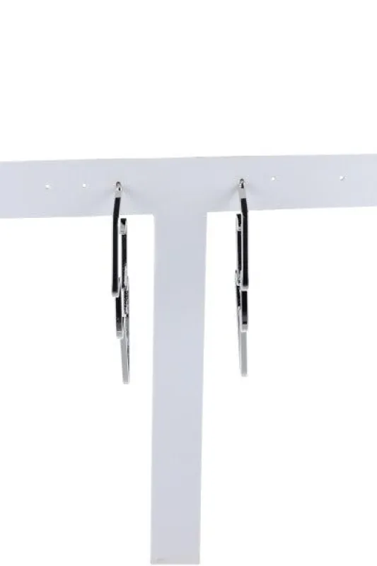 Aretes silueta rayo sold by Shasa