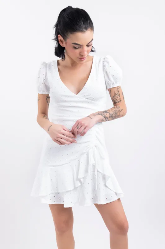Vestido mini cruzado eyelets sold by Shasa
