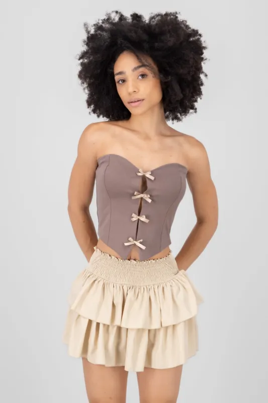 Top strapless detalle moños sold by Shasa